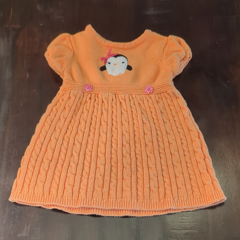 Adorable Orange Knit Baby Dress with Penguin Design